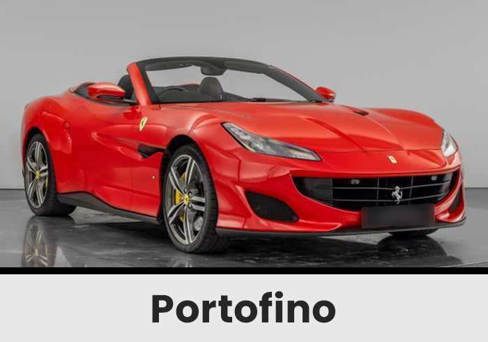 Red Ferrari Portofino Convertible with the Top Down Parked on a Glossy Showroom Floor